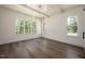 Bright dining room with hardwood floors, white trim, and trey ceiling at 8620 Dukes Lake Rd, Zebulon, NC 27597