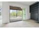 Open sliding doors leading to back porch from the living room at 8620 Dukes Lake Rd, Zebulon, NC 27597