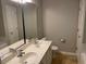 Bathroom featuring double sinks and a toilet at 8650 Neuse Landing Ln # 101, Raleigh, NC 27616