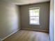 Bedroom featuring one window at 8650 Neuse Landing Ln # 101, Raleigh, NC 27616
