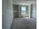 Spacious bedroom featuring a large window for natural light at 89 Grove Township Way, Angier, NC 27501