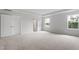 Bedroom featuring neutral walls and trim, carpet, and standard closet doors at 89 Grove Township Way, Angier, NC 27501