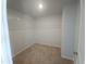 A walk-in closet with carpet and wire shelving at 89 Grove Township Way, Angier, NC 27501