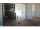 Open kitchen island with gray cabinets opens to the living and dining areas at 89 Grove Township Way, Angier, NC 27501