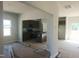 Modern kitchen features gray cabinets, stainless steel appliances, and a kitchen island at 89 Grove Township Way, Angier, NC 27501
