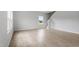 Bright and airy living room with hardwood floors and lots of natural light from the large window at 89 Grove Township Way, Angier, NC 27501