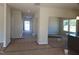 Open-concept living space with gray walls and bright natural light at 89 Grove Township Way, Angier, NC 27501