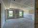 Main bedroom features a decorative trey ceiling and large windows at 89 Grove Township Way, Angier, NC 27501