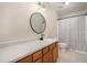 Well-maintained bathroom with a single sink vanity and shower-tub combination at 106 Teak Cir, Garner, NC 27529