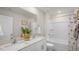 Bright bathroom features a double sink vanity with modern fixtures and a shower-tub combination at 1105 Ursa Major Ct, Wendell, NC 27591