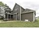 Charming two-story home with a screened-in porch and well-maintained lawn at 1108 Agio Ct, Zebulon, NC 27597
