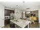Modern kitchen featuring stainless steel appliances and an island with sink at 1108 Agio Ct, Zebulon, NC 27597