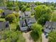 Aerial view of the home showcasing its location and landscaping in a residential neighborhood at 113 Laurel Branch Dr, Cary, NC 27513
