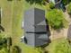 Aerial view of the home's roof, with a view of the backyard, the roof, and landscaping at 113 Laurel Branch Dr, Cary, NC 27513
