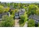 Aerial view of the home showcasing its location and landscaping in a residential neighborhood at 113 Laurel Branch Dr, Cary, NC 27513