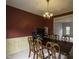 Formal dining room featuring a large table with chandelier lighting, perfect for Gathering gatherings at 113 Laurel Branch Dr, Cary, NC 27513