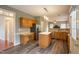 Spacious kitchen featuring wood cabinets, stainless steel appliances, and a functional island at 113 Laurel Branch Dr, Cary, NC 27513