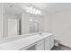 Spacious bathroom features double vanity, expansive mirror and a glass shower at 129 Gladstone Loop, Clayton, NC 27520