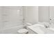 Bathroom featuring a tub, shower, toilet, vanity with sink, and white tiling at 137 Gladstone Loop, Clayton, NC 27520