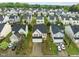 This is an aerial view of a cozy neighborhood showing an exterior elevation of the front yards and homes at 1533 Brown Owl Dr, Raleigh, NC 27610