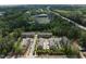 Beautiful aerial view of townhouse community near Topgolf sports complex and lush green trees at 1601 Bowery Dr, Raleigh, NC 27607