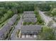 Stunning aerial view of well-maintained townhome community with mature trees and manicured landscaping at 1601 Bowery Dr, Raleigh, NC 27607