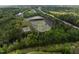 Overhead view of townhomes near the Topgolf sports complex, pond, and highways at 1601 Bowery Dr, Raleigh, NC 27607