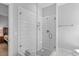 Contemporary shower featuring white subway tile, glass enclosure, and modern fixtures at 1601 Bowery Dr, Raleigh, NC 27607