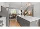 Open kitchen featuring a large island, stainless steel appliances, and an open floor plan at 1601 Bowery Dr, Raleigh, NC 27607