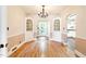 Living room with hardwood floors, archways and built-in cabinets provides a warm and inviting atmosphere at 1617 Woodland Ave, Burlington, NC 27215