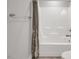 Clean bathroom with a white shower curtain and modern fixtures at 171 School Side Dr, Spring Lake, NC 28390