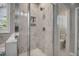 Elegant bathroom with glass-enclosed shower and marble tile at 171 School Side Dr, Spring Lake, NC 28390