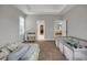 Neutral Bedroom features a crib and daybed, with doorway to closet at 171 School Side Dr, Spring Lake, NC 28390