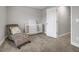 Bedroom featuring a baby chair, small crib and neutral tones at 171 School Side Dr, Spring Lake, NC 28390
