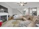 Bright living room features fireplace, plush seating, and open floorplan at 171 School Side Dr, Spring Lake, NC 28390