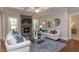 Inviting living room featuring a stone fireplace and coffered ceilings at 205 Riverine Dr, Pittsboro, NC 27312
