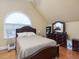 A primary bedroom suite with natural light and neutral colored walls at 206 Arbor Dr, Elon, NC 27244