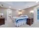 Spacious main bedroom with recessed lighting, bedside tables, and an ensuite bathroom in view at 206 Arbor Dr, Elon, NC 27244