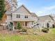 Spacious back yard with patio and garden pond with mature landscaping creates a private oasis at 206 Arbor Dr, Elon, NC 27244