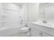 Crisp bathroom with a shower-tub combo, white vanity, and a mirrored wall cabinet at 21 Artesa Ct, Fuquay Varina, NC 27526