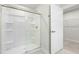 Bathroom featuring a walk-in shower, and a peek into the closet at 21 Artesa Ct, Fuquay Varina, NC 27526