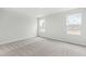 Bedroom with two windows, neutral walls and carpet at 21 Artesa Ct, Fuquay Varina, NC 27526