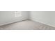 Bedroom with neutral walls and carpet and one window at 21 Artesa Ct, Fuquay Varina, NC 27526