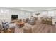 Bright and airy living room with stylish furniture and lots of natural light at 21 Artesa Ct, Fuquay Varina, NC 27526