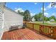 A wooden deck and porch with a view of the yard at 2108 Quail View Trail, Raleigh, NC 27604