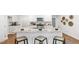 Well-equipped kitchen with white cabinets, granite countertops, and stainless steel appliances at 2140 Monk Dr, Haw River, NC 27258