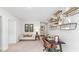 Versatile office space with desk, couch, and shelving, perfect for a functional and productive workspace at 2140 Monk Dr, Haw River, NC 27258