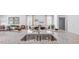 Kitchen with a large granite island and stainless steel sink at 2141 Monk Dr, Haw River, NC 27258