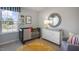 Comfortable Bedroom featuring a black crib, changing table, and fun alphabet rug at 2156 Monk Dr, Haw River, NC 27258