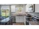 Granite countertops compliment this well-equipped kitchen with stainless appliances and ample storage at 2156 Monk Dr, Haw River, NC 27258